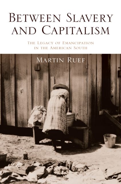 Between Slavery and Capitalism : The Legacy of Emancipation in the American South