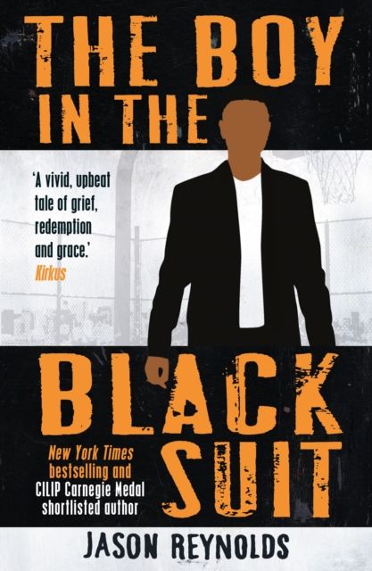 The boy in the black suit